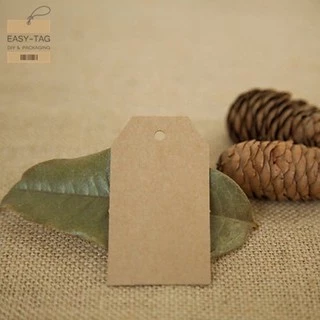 ป้ายแท็กเปล่าสี่เหลี่ยมตัดมุม (7x4cm) 1 แพ็ค =100 ชิ้น เป็นป้ายกระดาษใช้สำหรับห้อยสินค้า, บรรจุภัณฑ์