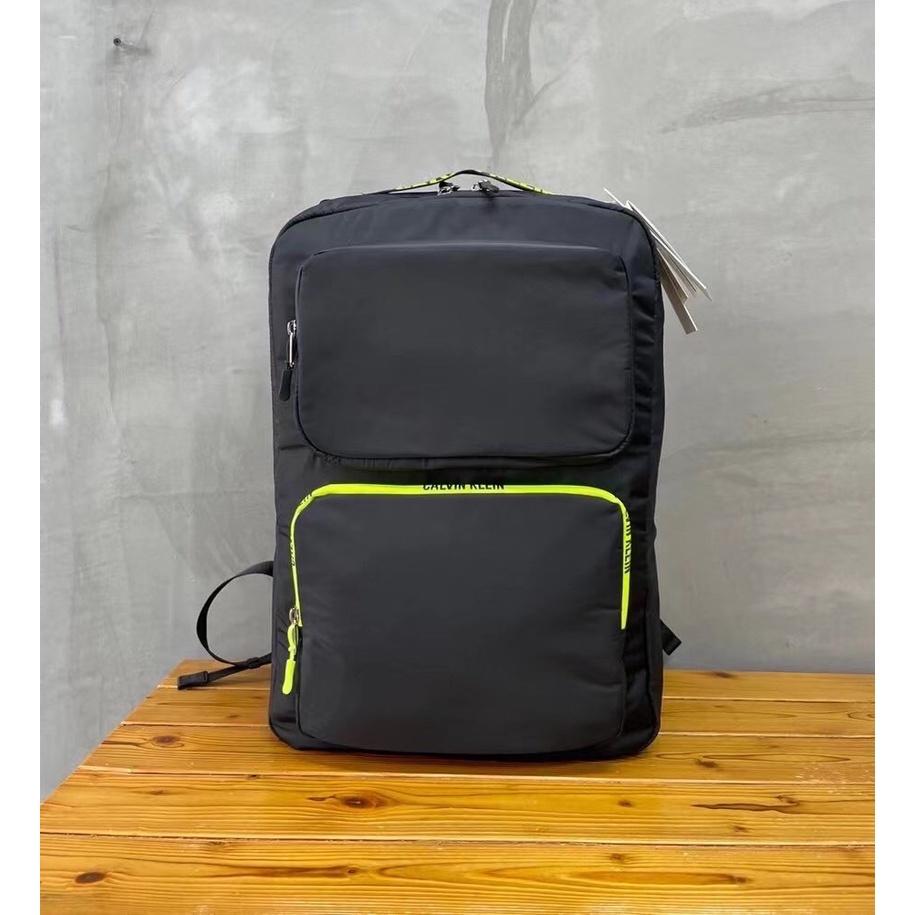 CALVIN KLEIN JEANS GREEN NEON LOGO PRINT BLACK NYLON BACKPACK กระเป๋าเป้สะพายหลัง แบรนด์คาลวินไคลน์ 