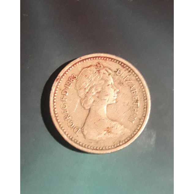 เหรียญอังกฤษ 1 ปอนด์ คศ.1983 ด้านหน้าควีนอลิซาเบธ ที่ 2 ด้านหลังตราราชวงศ์ เงินเก่าต่างประเทศ เงินยุุโรป