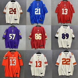 เสื้อกีฬารักบี้ แขนสั้น ความยาวปานกลาง ลายทีมชาติฟุตบอล Nfl American สไตล์ฮิปฮอป ฮาราจูกุ สําหรับผู้ชาย และผู้หญิง