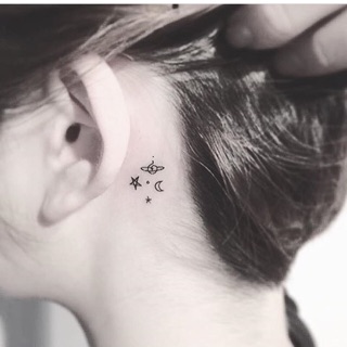 Tiny space tattoo