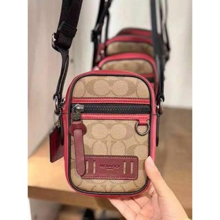 (ผ่อน0%) กระเป๋าสะพายข้าง COACH F89033 TERRAIN CROSSBODY IN COLORBLOCK SIGNATURE CANVAS ลายซี สีแดง