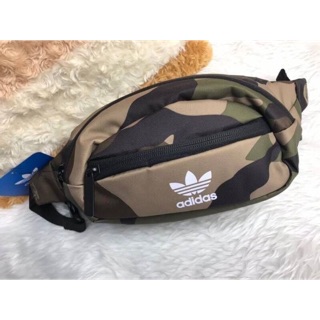 ✅พร้อมส่ง adidas Originals Camo Fanny Pack ✅ขนาด Dimensions: 14" (36cm) L x 7"(18cm) H x 4" (10cm) D.