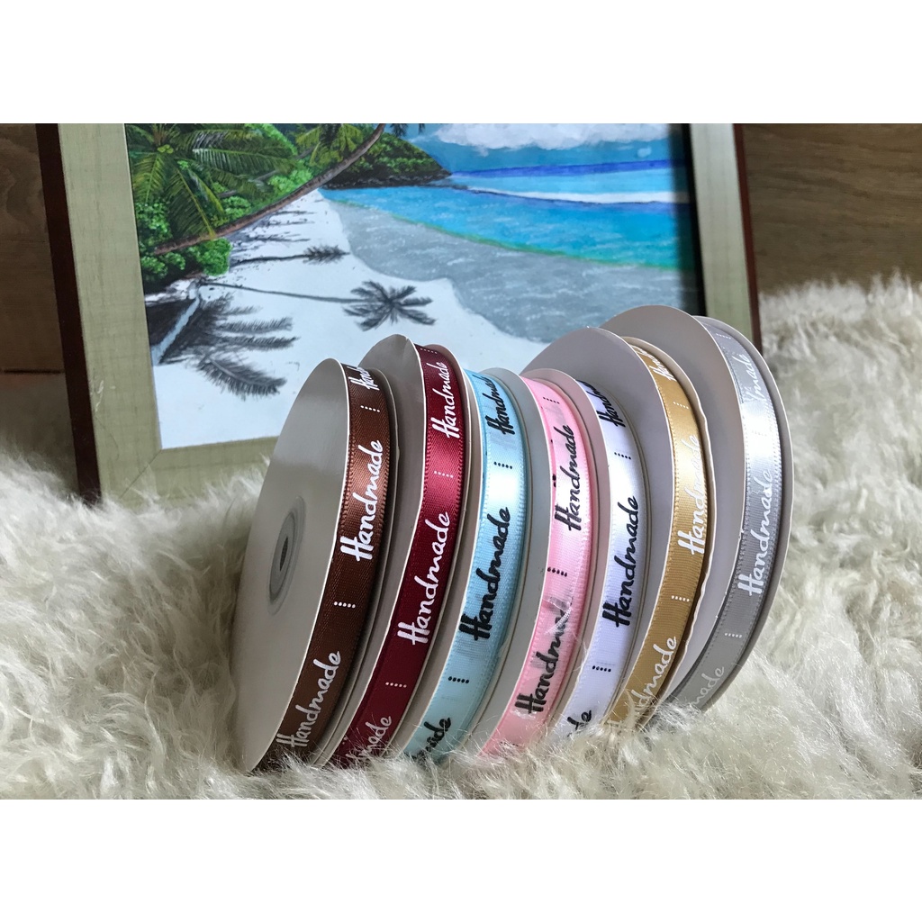 ขายยกม้วนพร้อมส่ง ริบบิ้นผ้าพิมพ์ลาย Handmade ขนาด 1 ซม. ยาว 50 หลา(ประมาณ 45 เมตร) /ม้วน มี 7 สี
