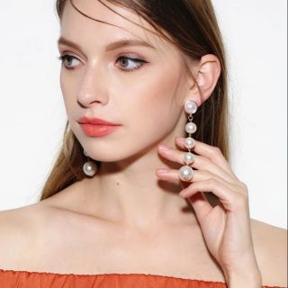 Long pearl earrings