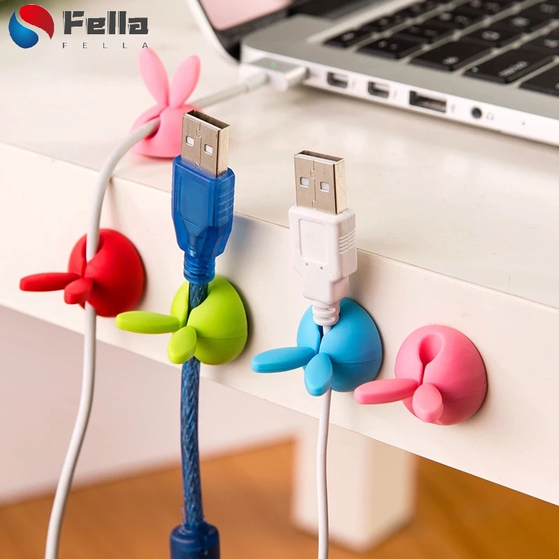 ที่เก็บสายชาร์จ USB รูปหูกระต่าย / ที่วางสายเคเบิลข้อมูล แบบตั้งโต๊ะ / ตัวจัดการสายเคเบิล แบบมีกาวในตัว ที่เก็บสายชาร์จโทรศัพท์ หูฟัง คลิปหนีบสายไฟ
