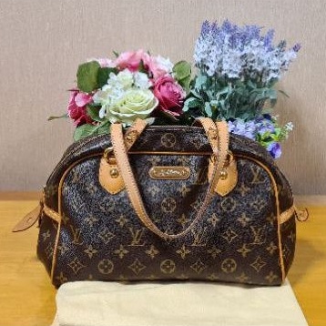 LV Montorgueil Monogram year 08 (good con)