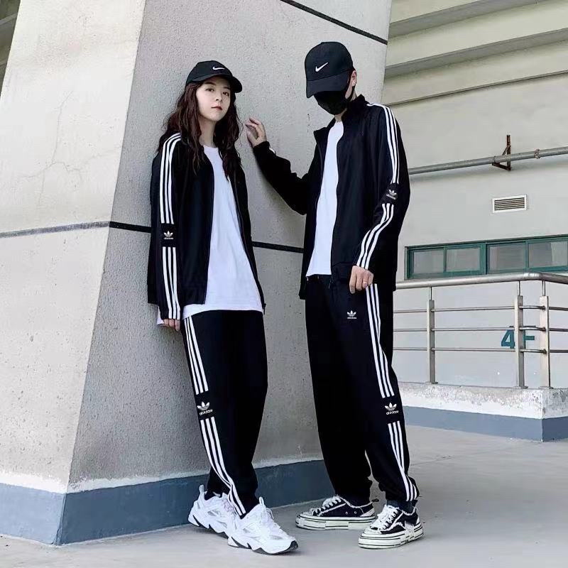 ADIDASชุด2ชิ้น เสื้อเเขนยาวกางเกงยาวตัวกันแดดกันลม ปกป้องผิวจากแสงแดด ใส่แล้วไม่ร้อนอบอ้าว สวมใส่ได้ทั้งช/ญ