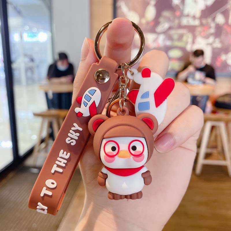 พวงกุญแจ จี้การ์ตูนเป็ดน่ารัก ขนาดเล็ก เหมาะกับของขวัญ สําหรับกระเป๋านักเรียน - รูปที่ 5