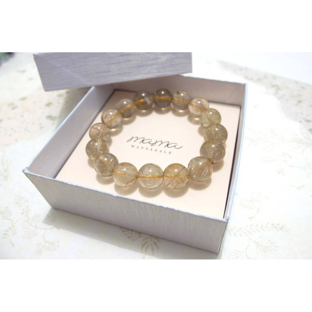 "Golden Rutilated Quartz" (ไหมทอง)