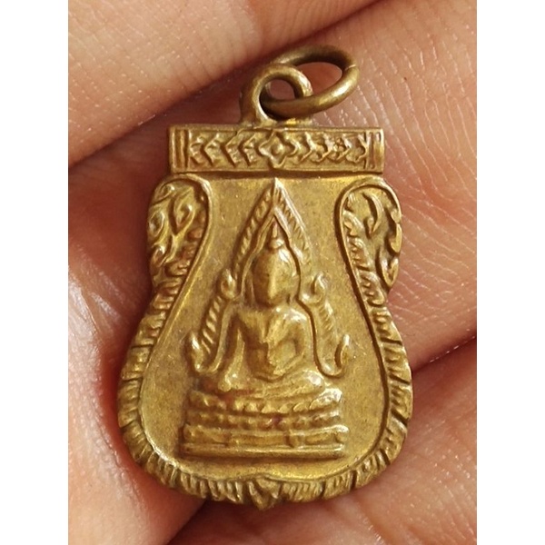 เหรียญเสมาเล็กพระพุทธชินราช หลังแม่นางกวัก เนื้อทองเหลืองเก่า