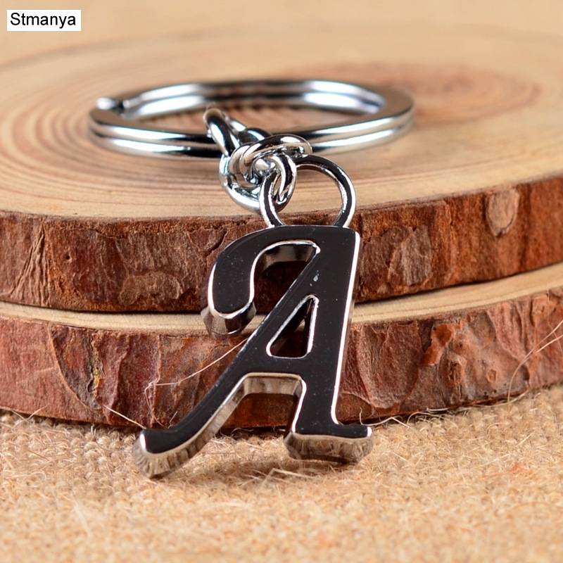 ใหม่ DIY AZ ตัวอักษรพวงกุญแจสีเงินพวงกุญแจโลหะผู้หญิงพวงกุญแจรถ Simple Letter ชื่อ Key Holder Party ของขวัญเครื่องประดับ