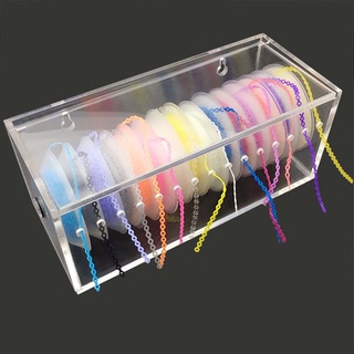 The acrylic rubber box for storing high quality dental chains.