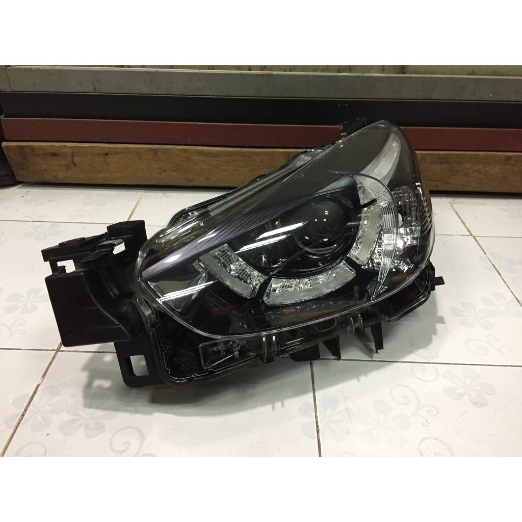 ไฟหน้า Mazda2 skyactiv 2016 LED Projector ตัวTOP ของแท้มือสอง สภาพดี ไม่ซ่อม ข้างซ้าย