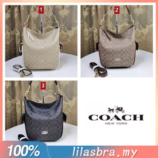 ✨ลิลี่ แคนาดา ช้อปปิ้ง✨ C1523 Coach กระเป๋าสะพาย Pennie ผ้าใบซิกเนเจอร์ สะพายไหล่ผู้หญิง /สลิง / กระเป๋าถัง/กระเป๋าสะพาย