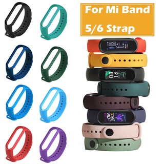 Xiaomi Mi Band 3 / 4 / 5 / 6 สายรัดข้อมือซิลิโคนแบบนิ่มสำหรับเล่นกีฬา [คลังสินค้าพร้อม]