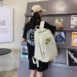 Nike backpack กระเป๋าเป้สะพายหลังแฟชั่นลำลองที่สวยงามกระเป๋านักเรียนชาย/หญิงกระเป๋าเป้สะพายหลังความจุขนาดใหญ่กันน้ำ