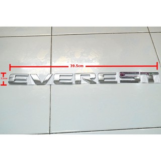 ป้ายโลโก้ FORD EVEREST ขนาด 3.5x39.5cm โครเมี่ยมติดตั้งด้วยเทปกาวสองหน้าด้านหลัง