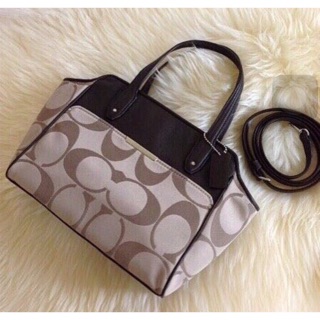 Coach signature printed with leather strap