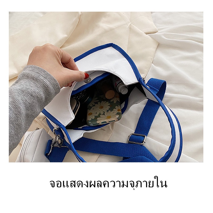 JUST STAR กระเป๋าใบเล็กของผู้หญิงความรู้สึกระดับไฮเอนด์การออกแบบเฉพาะกระเป๋าสะพายไหล่และรักแร้