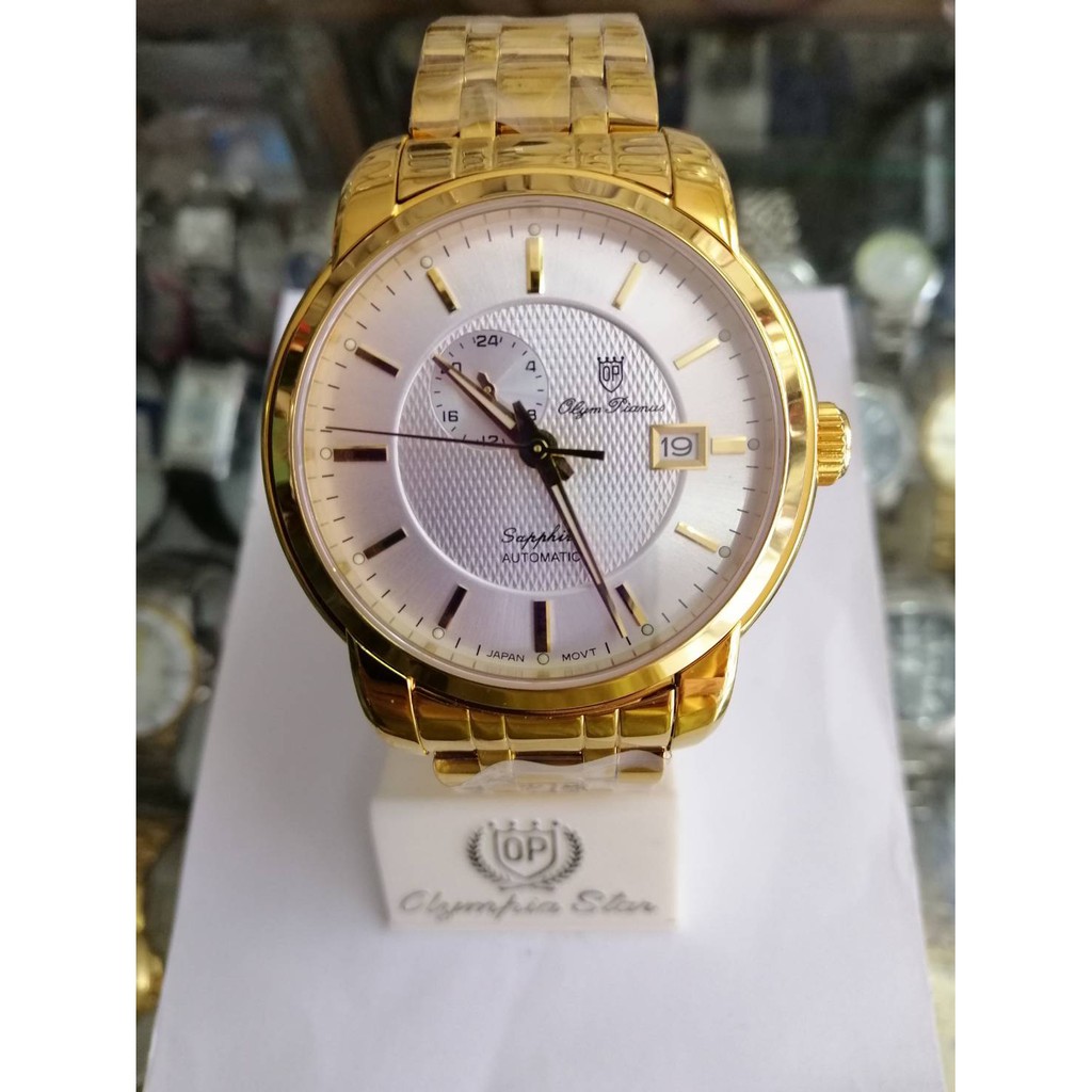 นาฬิกา Olym pianus (OP) sportmaster sapphire ระบบ Automatic ตัวเรือนทอง หน้าปัดขาว