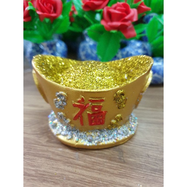 **ก้อนทอง** ทำจากเรซิ่นติดกากเพชร – โปรปัง