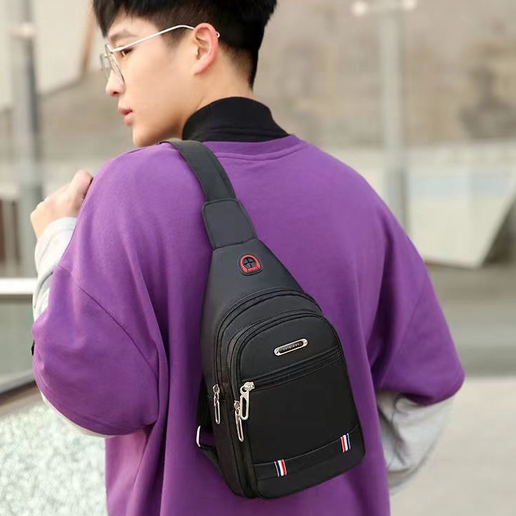 🔥ใส่โค้ด INCLZ12 ลด 50%🔥 กระเป๋าคาดอกผู้ชาย มีหลายช่องให้จุของ เนื้อผ้าอ็อกซ์ฟอร์ด กันน้ำ