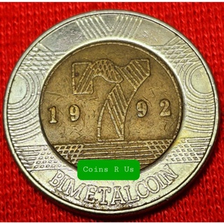 เหรียญต่างประเทศ Token 7 Bimetalcoinไม่ทราบที่ 2 สี ปี 1992 ขนาด 26 มม. ผ่านใช้น่าสะสม