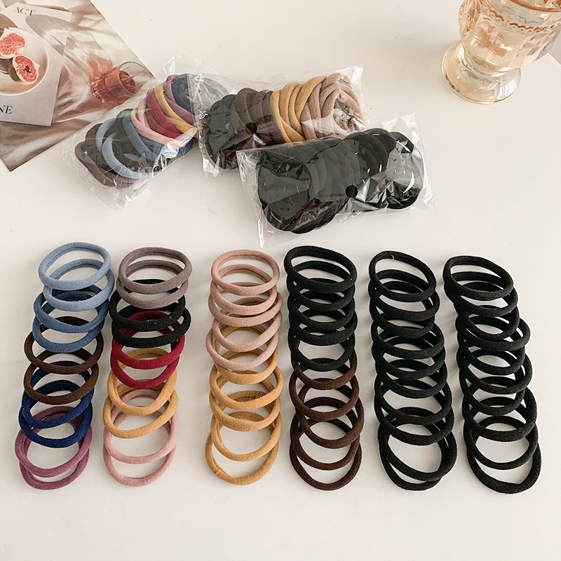 20 ชิ้น/เซ็ตไม่มีรอยต่อแพ็คยืดหยุ่นสูงผม Tie Basic อเนกประสงค์ผู้หญิงสีดํายาง Band Scrunchie