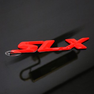 โลโก้ SLX สีแดง ขนาด 2.5 x 16 cm. ติดข้างประตู ISUZU D-MAX