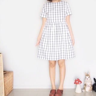 เดรสจากแบรนด์ Need a new needle : White Grid Dress