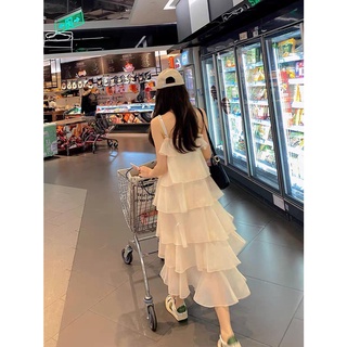 AC1199 ชุดเดรสสายเดี่ยวยาวสีขาว ทรงขนมชั้น ผ้าพริ้วใส่สบาย