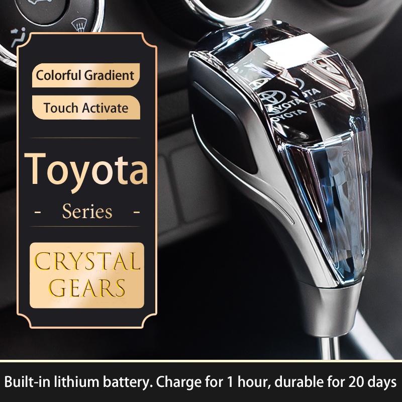 หัวเกียร์รถยนต์ ประดับคริสตัล พร้อมโลโก้รถยนต์ สําหรับ Toyota Hilux Corolla Cross L Yaris Fortuner Alphard Vios Camry C-HR Sienta Auto Gear Shift Knob Crystal with Car Logo Flash