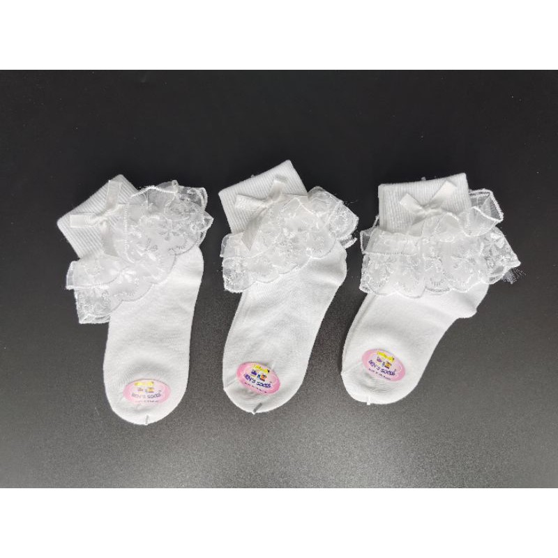 ถุงเท้า​ลูกไม้​ระบาย​เด็ก​5-7​ปี​สี​ขาว​ขาย​คู่​ละ​40บาท​