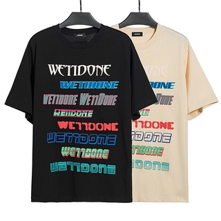 เสื้อยืดแขนสั้นลําลอง ผ้าฝ้าย ทรงหลวม พิมพ์ลาย WELLDONE สีพื้น แฟชั่นคู่รัก สไตล์คลาสสิก สําหรับผู้ชาย และผู้หญิง