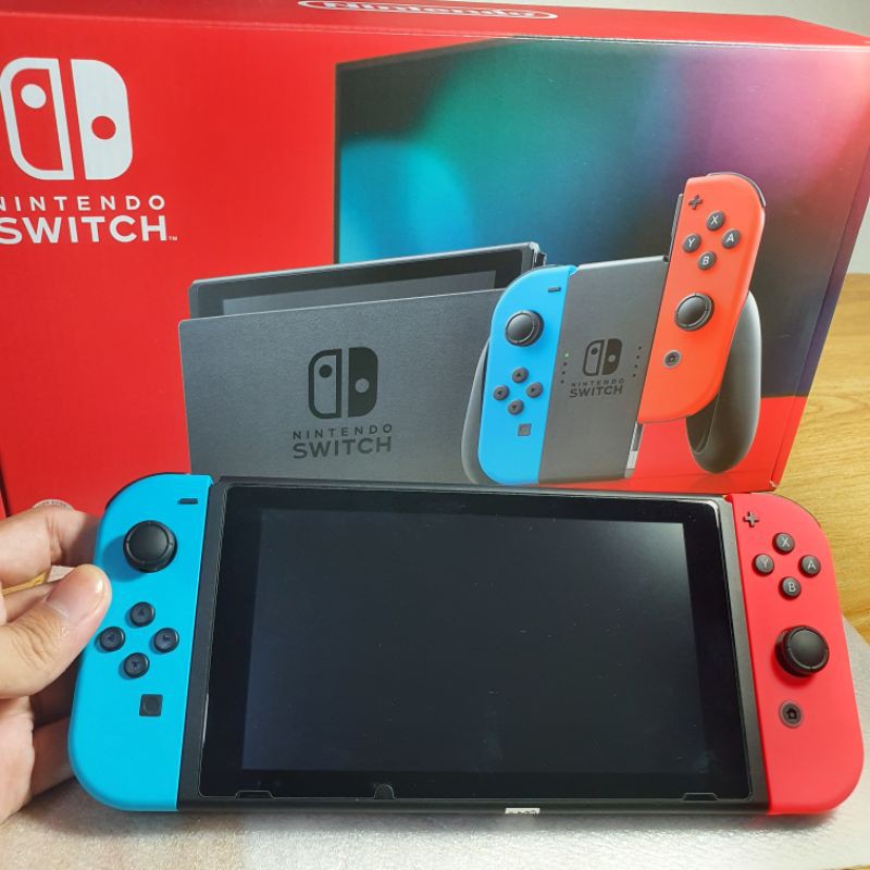 Nintendo Switch รุ่นกล่องแดงแบตอึด สีนีออน มือสองใช้เองสภาพ 95% (ไม่ค่อยได้เล่น) ของแถมเพียบ