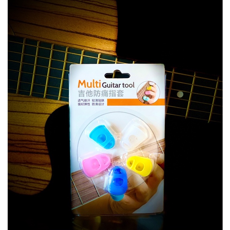 Multi Guitar Toolปลอกนิ้วกันเจ็บนิ้วเวลาเล่นกีตาร์และสำหรับผู้กำลังหัดเล่นกีตาร์ใหม่ๆลืมเจ็บมือไปเลยจร้าน
