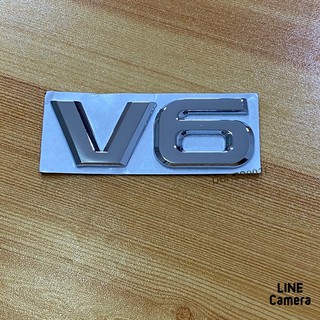 โลโก้* V6 งานโลหะ ( ขนาด* 3 x 9 cm ) ราคาต่อชิ้น