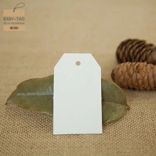 ป้ายแท็กเปล่าสี่เหลี่ยมตัดมุม (7x4cm) 1 แพ็ค =100 ชิ้น เป็นป้ายกระดาษใช้สำหรับห้อยสินค้า, บรรจุภัณฑ์