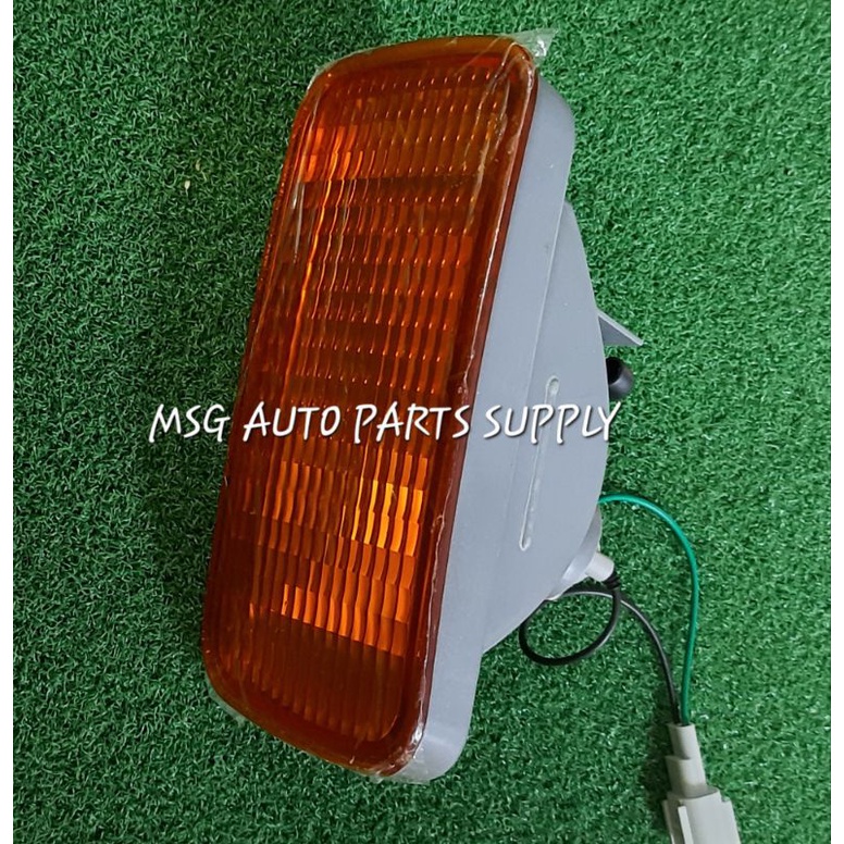 โคมไฟกันชน~Amber (สีเหลือง) NISSAN LKA/PKD211