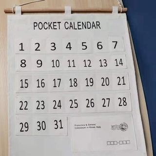 Pocket calendar  ปฏิทินออมเงิน ปฏิทินออมเงิน แบบเเขวนผนัง พร้อมช่องกระเป๋า พร้อมช่องกระเป๋า แบบแขวนผนัง