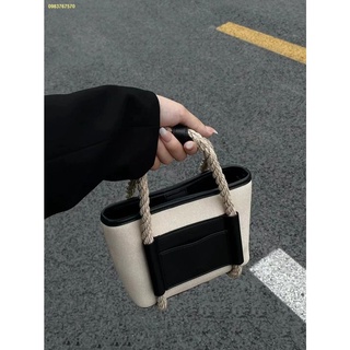 ❤️ Spot Walking mobile phone small bag 2022 new design bucket bag hand-held canvas bag women s all-match