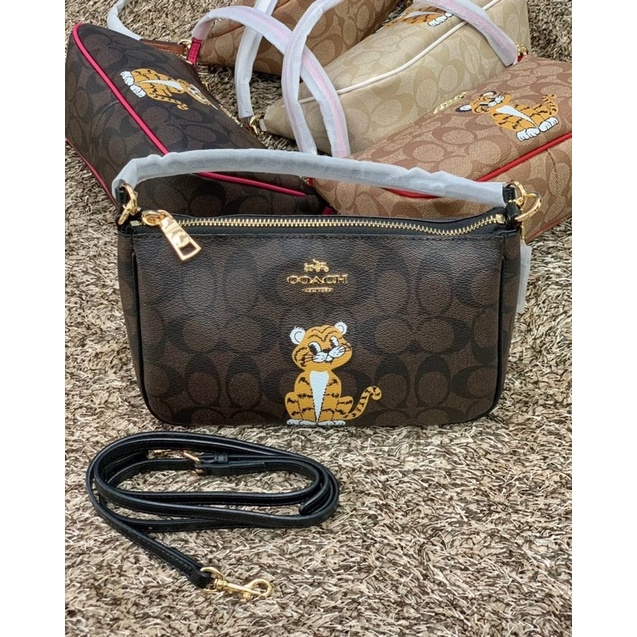 COACH TOP HANDLE POUCH SIGNATURE WITH BABY TIGER PRINT