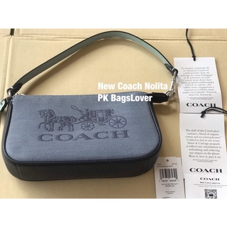 กระเป๋าพอร์ช คล้องมือ Coach Nolita ผ้ายีนส์ สีฟ้า ลายรถม้า