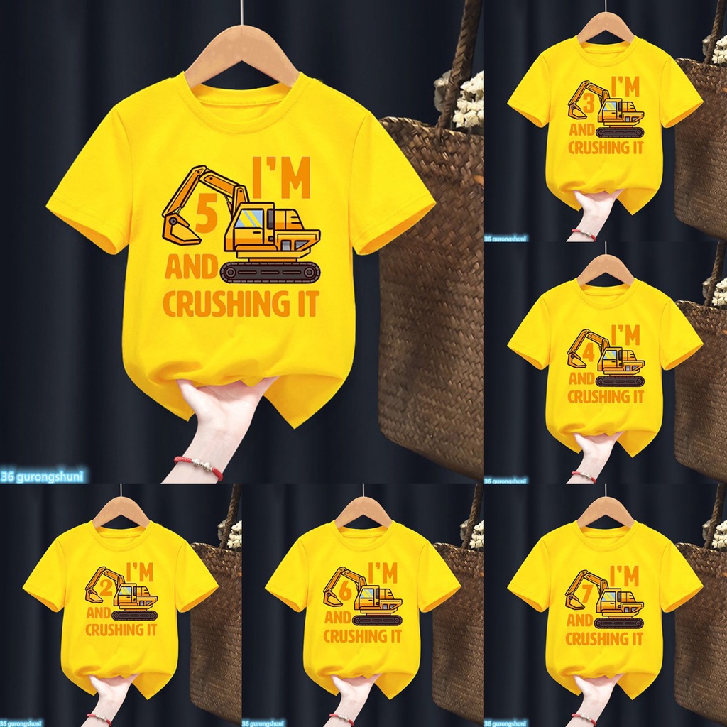 เด็กชายตลกเสื้อยืดรถขุดเสื้อยืดพิมพ์กราฟิก 2 3 4 5 6 7.8.9ไทย วันเกิดชื่อเครื่องแต่งกายชื่อเสื้อยืดสีเหลืองท็อปส์