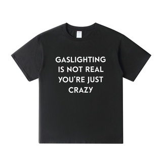 เสื้อยืดลําลอง แขนสั้น พิมพ์ลาย Gaslighting Is Not Real Youre Just Crazy สําหรับผู้ชาย และผู้หญิง