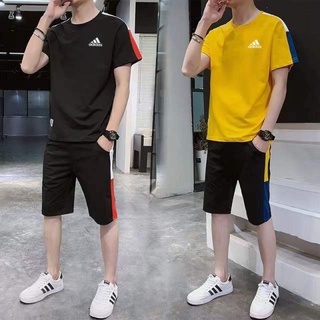 สินค้าพร้อมส่ง เสื้อ+กางเกงขาสั้น ผ้าเบา ไม่หด ไม่ย้วย เสื้อยืดคอกลมสีพื้น ชุดกีฬาลำลองผู้ชาย