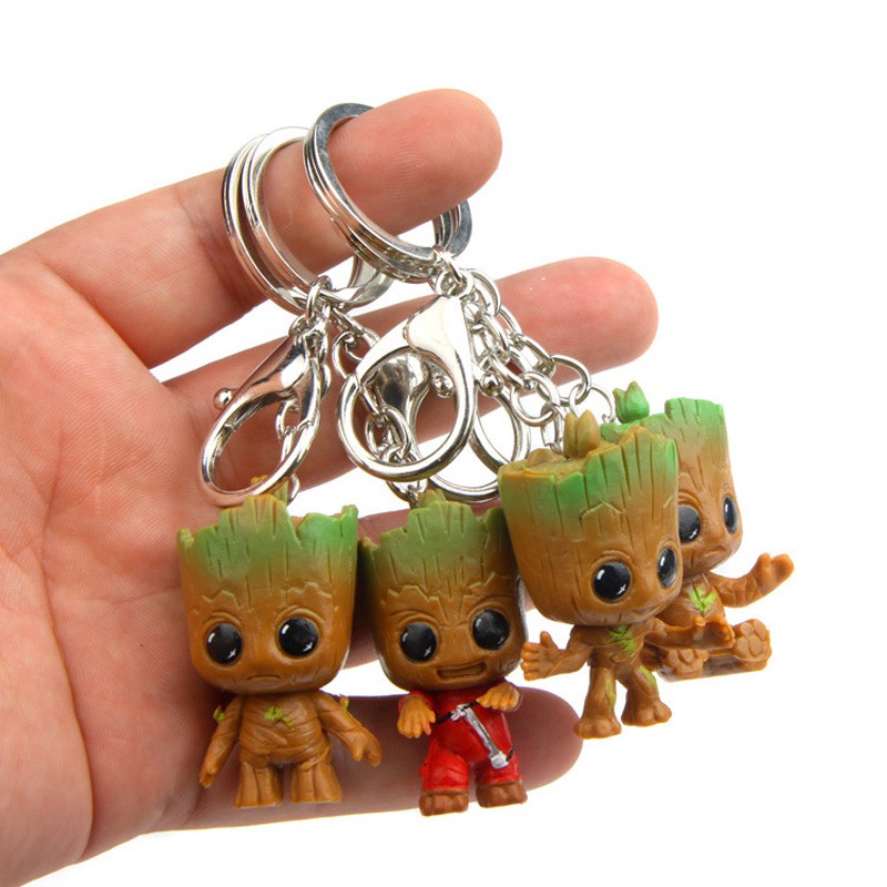 4 ชิ้น / ชุด Kawaii Groot ฟิกเกอร์ Guardians of the Galaxy พวงกุญแจ เด็ก ต้นไม้ พวงกุญแจ ตุ๊กตา ของสะสม ของเล่นเด็ก