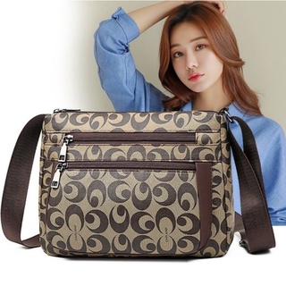 กระเป๋าลายcoachแท้มีหลายช่อง
