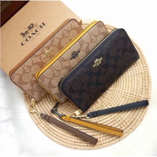 COACH LONG ZIP AROUND WALLET IN SIGNATURE CANVAS (COACH C4452)